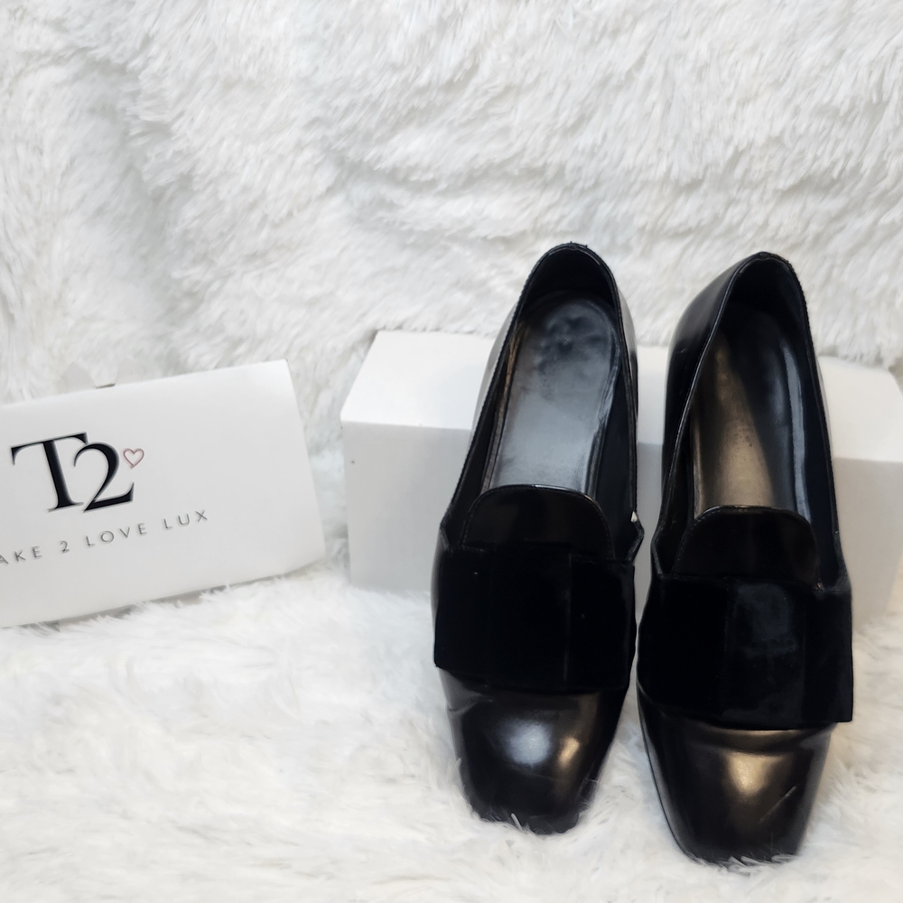 Elegant Black Leather Stuart Weitzman Flats